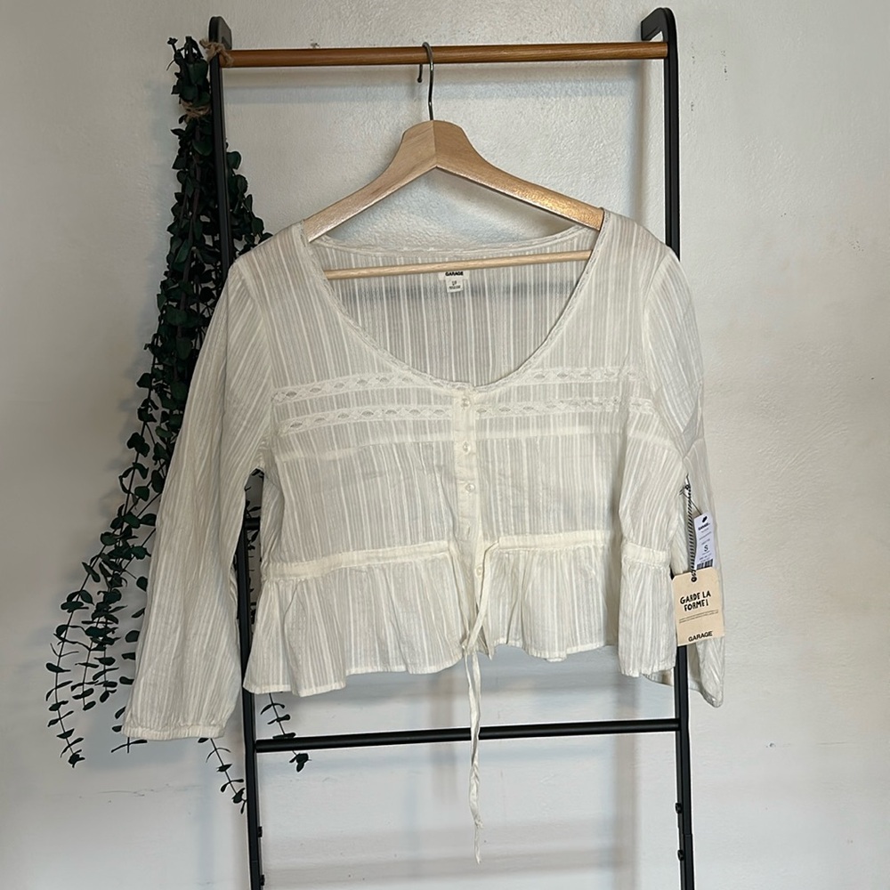 Garage 3/4 sleeve peplum top